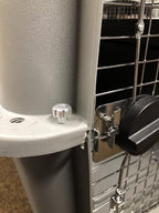Solid metal kennel replacement nuts and bolts package detailing three lengths of steel screws.