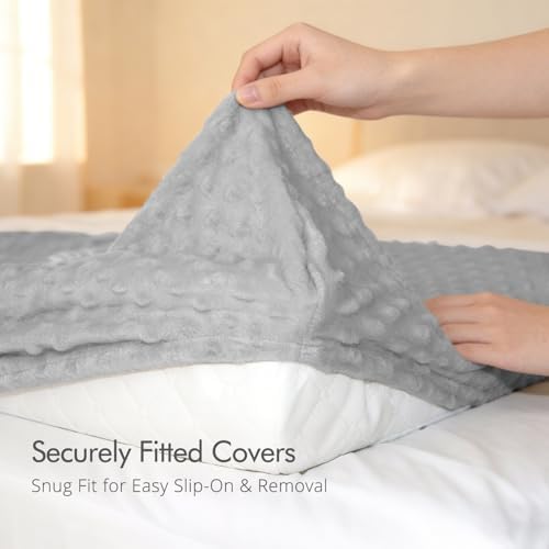 Queness infant changing table cover fitted tightly over a standard contoured diaper pad