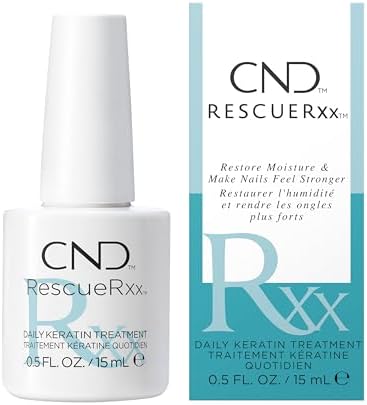 CND keratin nail treatment being applied to damaged fingernails.