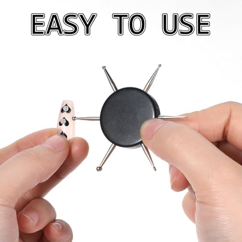 Manicure artist using circular dotting tool for nail design