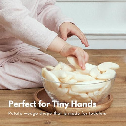 Naeiae wholesome baby food puff snacks organized neatly to illustrate safe infant self feeding portions.