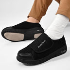 Adjustable footwear for swollen feet showing the wide opening mechanism.