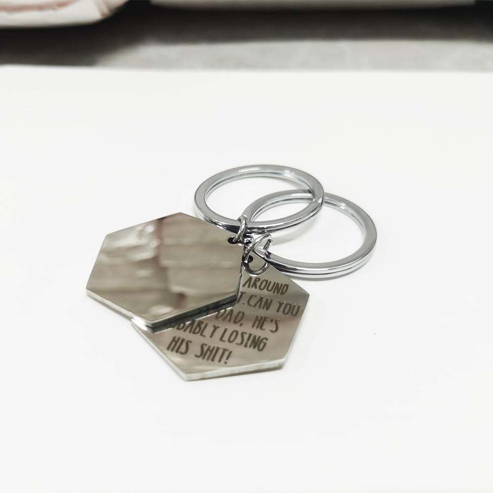 Generic stainless steel puppy ID tag side view demonstrating the thick durable profile.