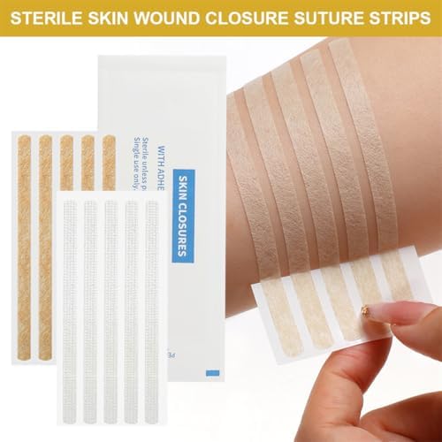 Hypoallergenic non woven medical skin closures applied across a minor cut demonstrating proper wound edge alignment.
