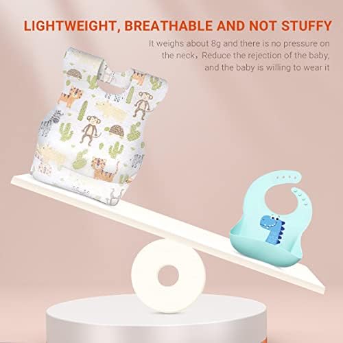 Close up view of the adjustable adhesive neck tabs on a waterproof toddler disposable bib