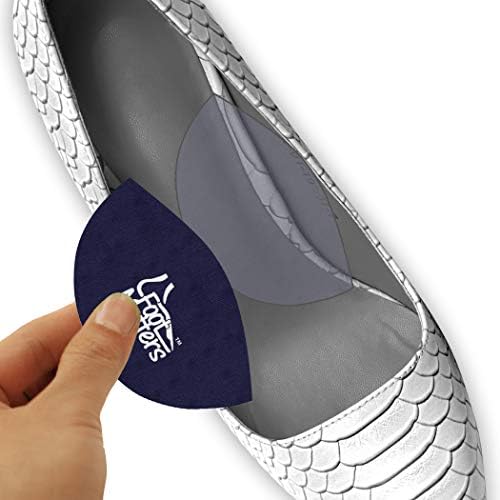 Adhesive backing on FootMatters large arch pads for secure shoe placement.