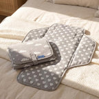 Detail shot of the built-in pillow on Phoebus Baby changing pad