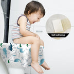 Toddler using a public restroom with a kimitimi patterned protective potty liner covering the seat.