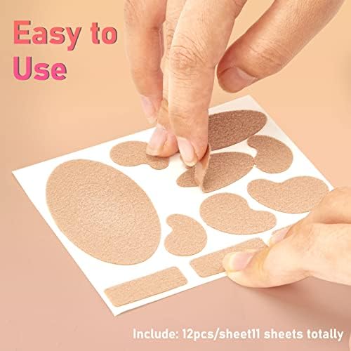 Tan flannel moleskin strips being applied to the heel of a foot