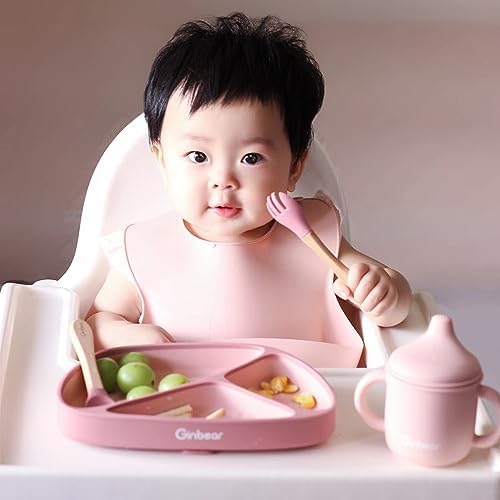 Close up of ergonomic baby fork and spoon handles
