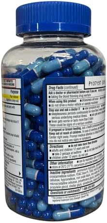 Kirkland Signature rapid release blue and white gelcaps for nighttime headache relief.