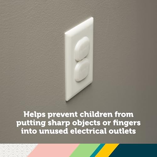 Close up of Safety 1st white outlet plug protectors