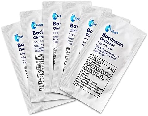 One hundred and forty-four count box of Globe Bacitracin Zinc Ointment spread out neatly