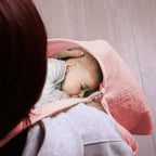 Mother using Zdolmy breathable muslin nursing cover for breastfeeding