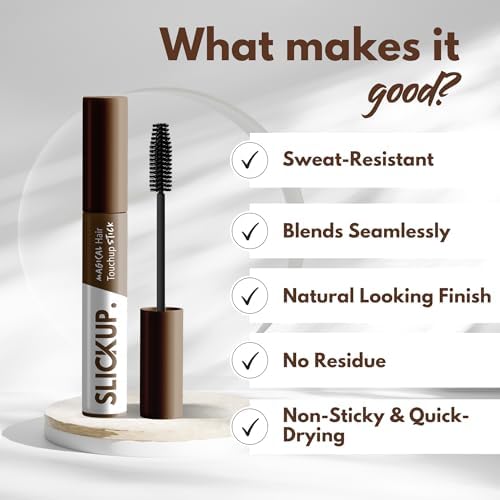 Applying brown hair touch up stick to roots