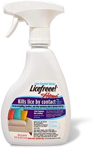 Application process of Licefreee spray on dry hair for effective lice removal.