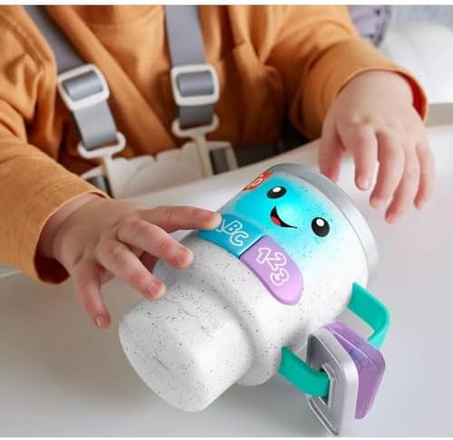 Fisher-Price musical baby mug displaying the cute green matcha latte swirl side.
