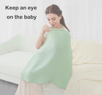 Multi-use demonstration of nursing cover as a car seat canopy.
