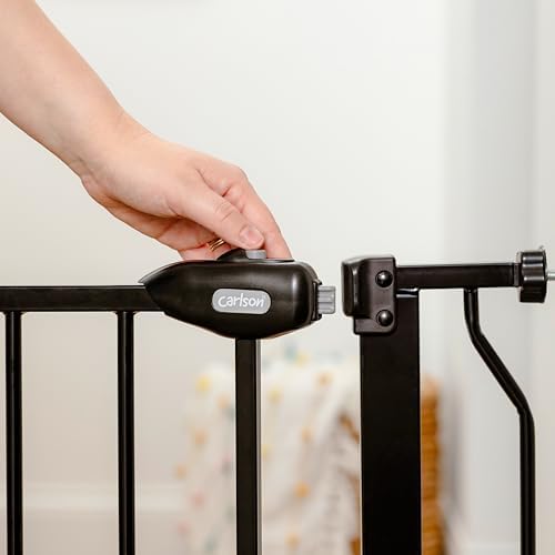 All steel chew proof dog gate installed at bottom of staircase