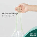 Close up view of the built in drawstring mechanism on a disposable potty training bag