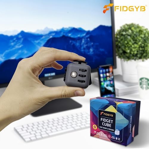 Six sided ADHD fidget block highlighting the clicking buttons and rolling metal ball mechanism.