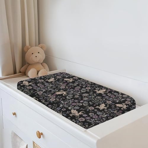 Baby changing table styled with fantasy dragon theme cover
