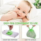 Close-up view of the green baby diaper trash bags showing tie handles.