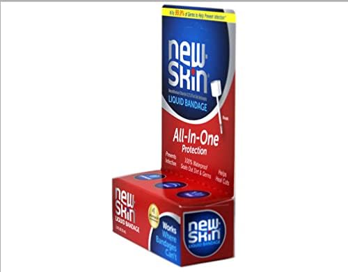 Back label of New Skin liquid bandage displaying the active first aid ingredients and usage directions