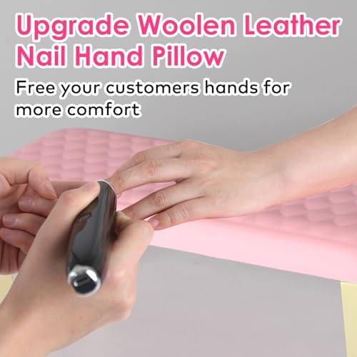 Close up of microfiber leather texture on pink nail cushion.
