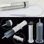 Disassembled GNEGKLEAN cleaning douche system showing easy maintenance design.
