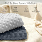 Queness diaper changing table sheet folded to display ultra soft fabric texture.