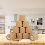 Side view of Mooerca flexible self adherent bandage roll illustrating the two inches width and elastic texture