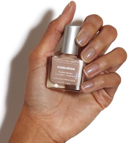 Dermelect Camo-Nude treatment showing the natural sheer nude finish on manicured nails.