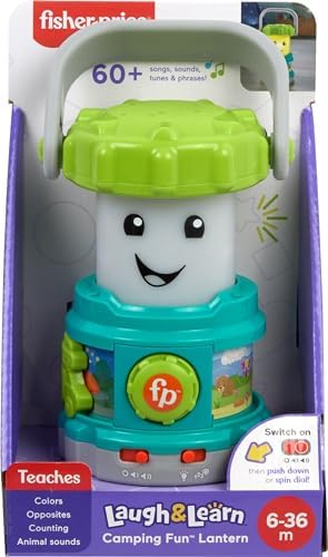 Toddler holding the imported pretend camping gear toy by its carrying handle.