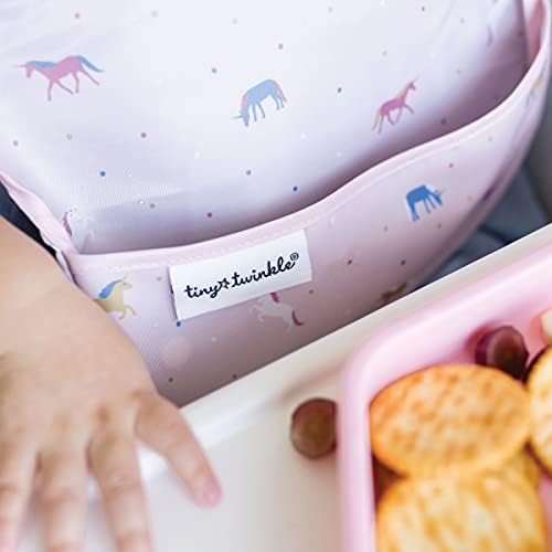 Adjustable side closure detail on a Tiny Twinkle mess-proof bib