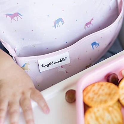 Adjustable side closure detail on a Tiny Twinkle mess-proof bib