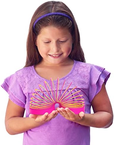 Three neon colored plastic Slinky spring toys stacked together on a clean background