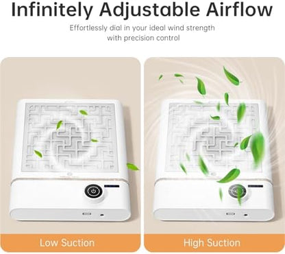 Professional nail tech using rechargeable dust collector at desk
