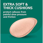 Applying Dr. Scholl's medicated disc to foot for targeted callus removal.