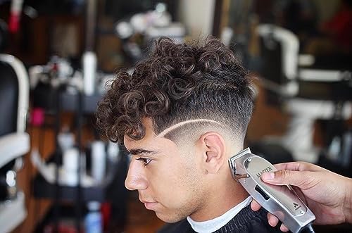Close up of carbon steel T-blade on Andis Master clipper