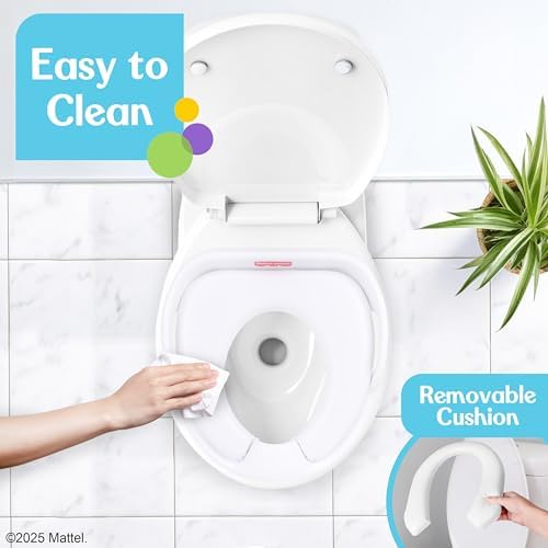 Underneath view of the white Fisher-Price potty seat highlighting the non-slip rubber grips