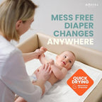 Modera baby changing pad liners in use on surface