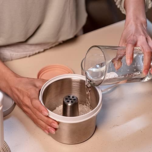Béaba Babycook Neo accessory inside the main glass bowl setup