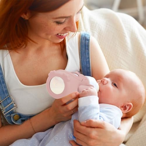 Baby holding glass bottle with Busoha silicone sleeve