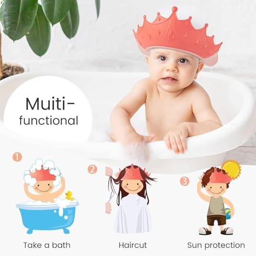 Toddler wearing pink crown bath visor during hair wash
