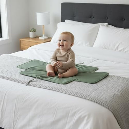 Zicoto portable changing mat fitting into a diaper bag