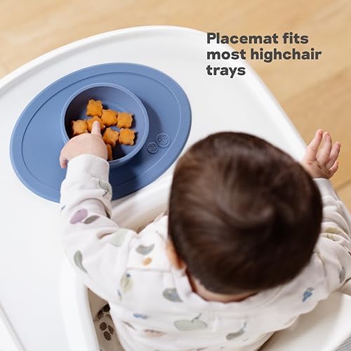 Side view demonstrating the non slip suction grip of the Ezpz baby mat on a tabletop