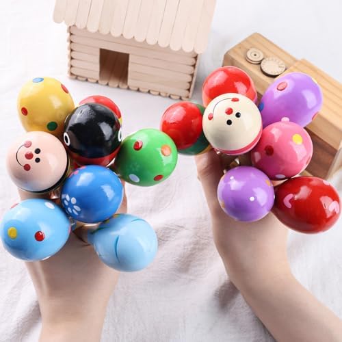 POPLAY non toxic wooden maracas showing the small sizing details suited for baby grip training