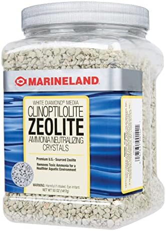 Aquarium water care product jar placed next to fish tank