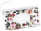 Itzy Ritzy travel wipes case hanging from a stroller handle